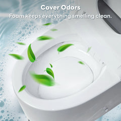 A close-up of a white toilet bowl with text reading 'Cover Odors' and 'Foam keeps everything smelling clean.' Green leaf graphics and soap bubbles suggest odor-removal foam.