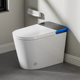Modern white toilet with a digital control panel in a bathroom setting