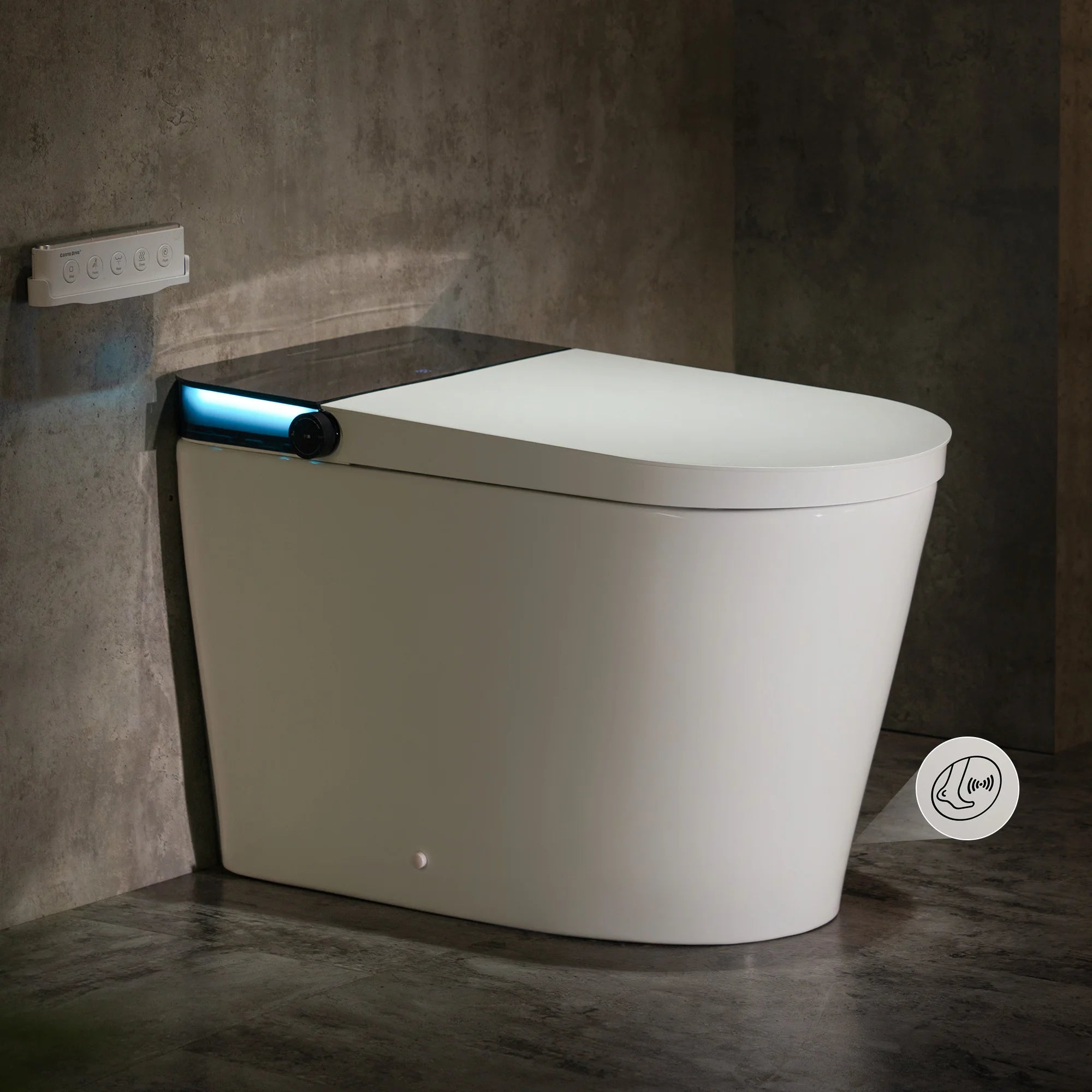 Modern white toilet against a concrete wall with a visible foot flush logo.
